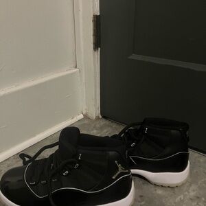Jordan 11 Retro Jubilee Black and White Sneakers